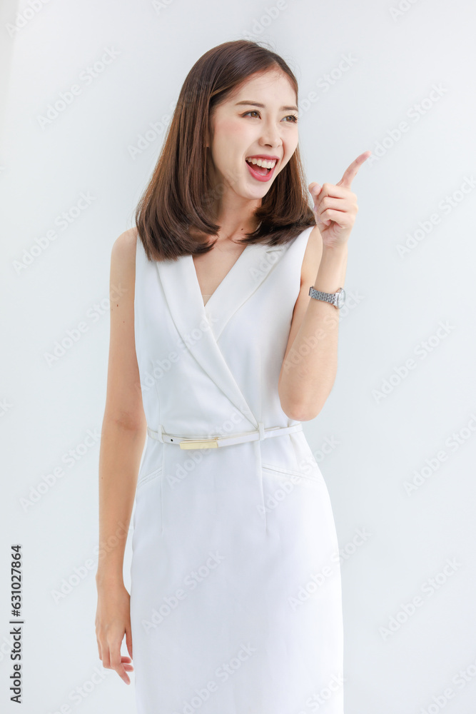 Portrait isolated cutout studio shot of Asian beautiful professional successful female businesswoman ceo entrepreneur in casual business wear standing smiling posing crossed arms on white background Portrait isolated cutout studio shot of Asian beautiful professional successful female businesswoman ceo entrepreneur in casual business wear standing smiling posing crossed arms on white background