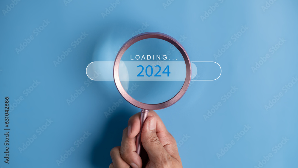 Loading To Next Year 2024 Concept Words 2024 Plans On Magnifying Glass   1000 F 631042686 Uxy9lU2KDJ2eaPa4Mf9lnSYrvd6FIst0 