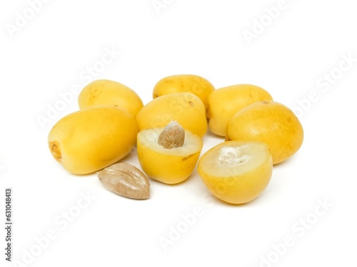 Fresh date palm yellow chemical free placed on a white background.