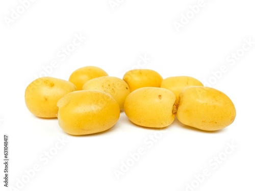 Fresh date palm yellow chemical free placed on a white background.