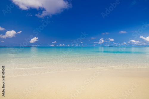 Tropical beach view. Closeup sea calm relax sea waves. Sunny blue sky clouds over seascape, white sand. Tranquil peaceful nature concept. Meditation inspiration Mediterranean coast panoramic landscape