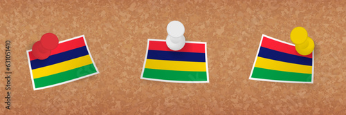 Mauritius flag pinned in cork board, three versions of Mauritius flag.