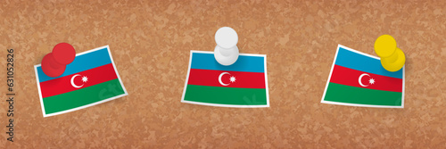 Azerbaijan flag pinned in cork board, three versions of Azerbaijan flag.