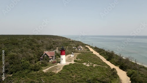 Nauset Light - Restored Lighthouse On The Cape Cod National Seashore Near Eastham In Massachusetts, USA. aerial orbit photo