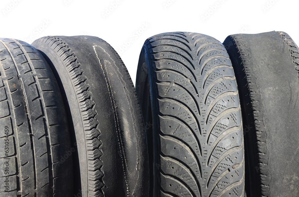 Obraz premium old worn damaged tires isolated on white background
