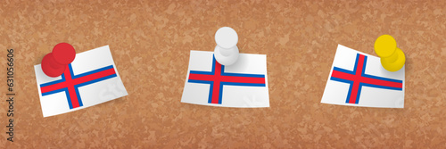 Faroe Islands flag pinned in cork board, three versions of Faroe Islands flag.