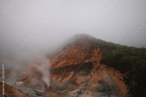 Beautiful valley of Jigokudani or "Hell Valley", located just above the town of Noboribetsu Onsen, which displays hot steam vents Hokkaido Japan