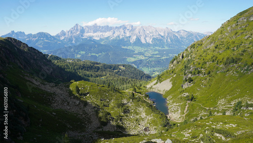 Reiteralm loop hiking trail with views on the Dachstein Mountains in Schladming, Austria. photo