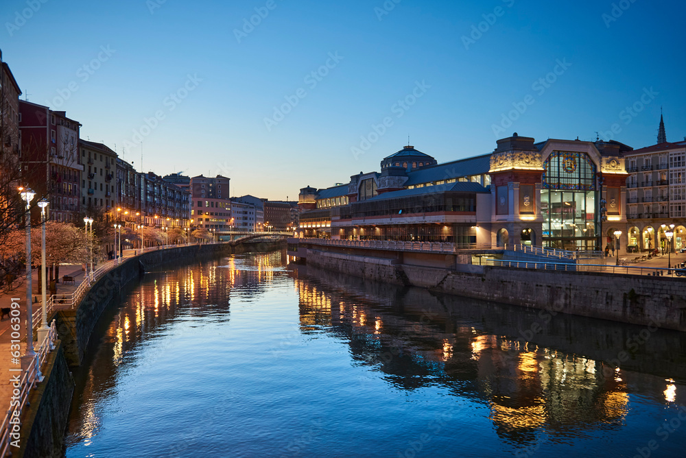 View of the Nervion river and Rivera market at evening, BilbaoEurope.