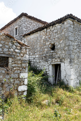 Ancient abandoned house complex, stony aged architecture