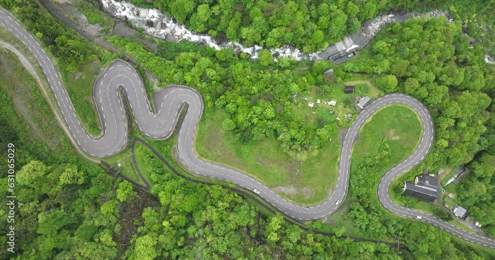 Road aerial drone view, twisting mountain road through nature. Road aerial drone view, twisting mountain road through nature.