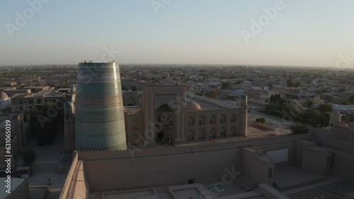 Aerial drone point of the Itchan Kala and Alla Kouli Khan Madrasa at the old walled city of Khiva in Uzbekistan. photo