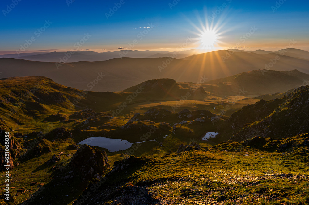 Fotografie Mountain landscape with the rising sun