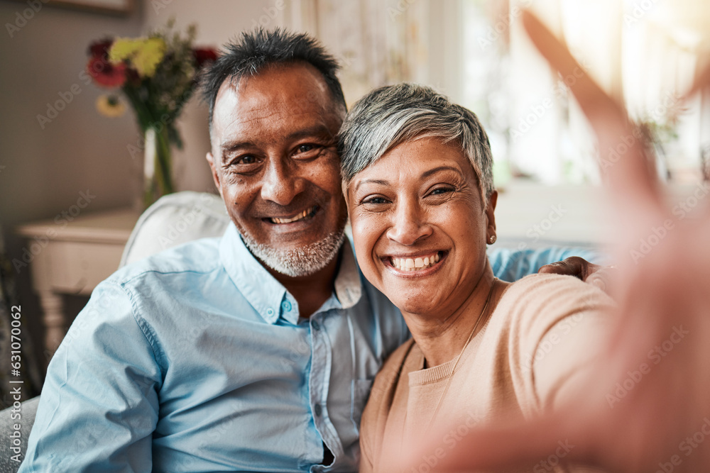Senior couple, selfie and happy on home sofa with a smile, happiness and love. Mature man and woman relax together on a couch for profile picture, social media and commitment or memory of marriage Senior couple, selfie and happy on home sofa with a smile, happiness and love. Mature man and woman relax together on a couch for profile picture, social media and commitment or memory of marriage