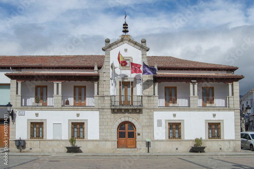 Town hall building of the Villa de los Molinos, province of Madrid. Spain the street sign says spain square
