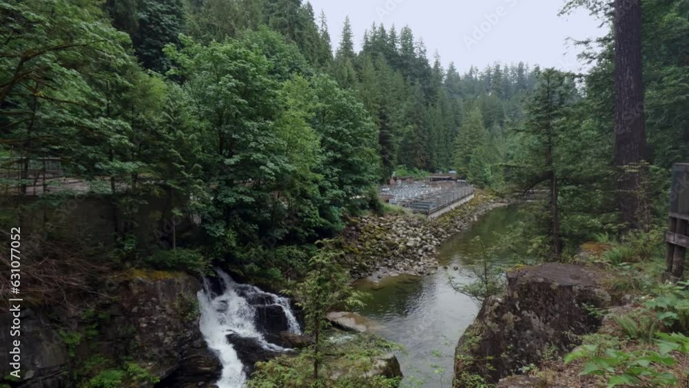 Enchanting Waterfall At Capilano River Regional Park In North Vancouver, Canada. high angle, wide Enchanting Waterfall At Capilano River Regional Park In North Vancouver, Canada. high angle, wide
