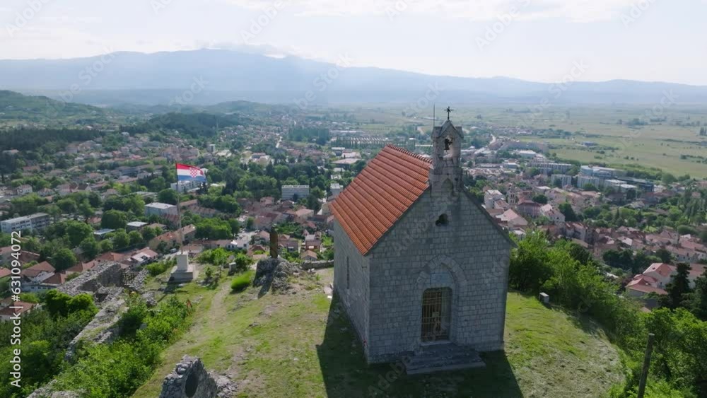 Aerial View Of Fortress On Mountaintop And Old Town In Sinj, Croatia. Aerial View Of Fortress On Mountaintop And Old Town In Sinj, Croatia.
