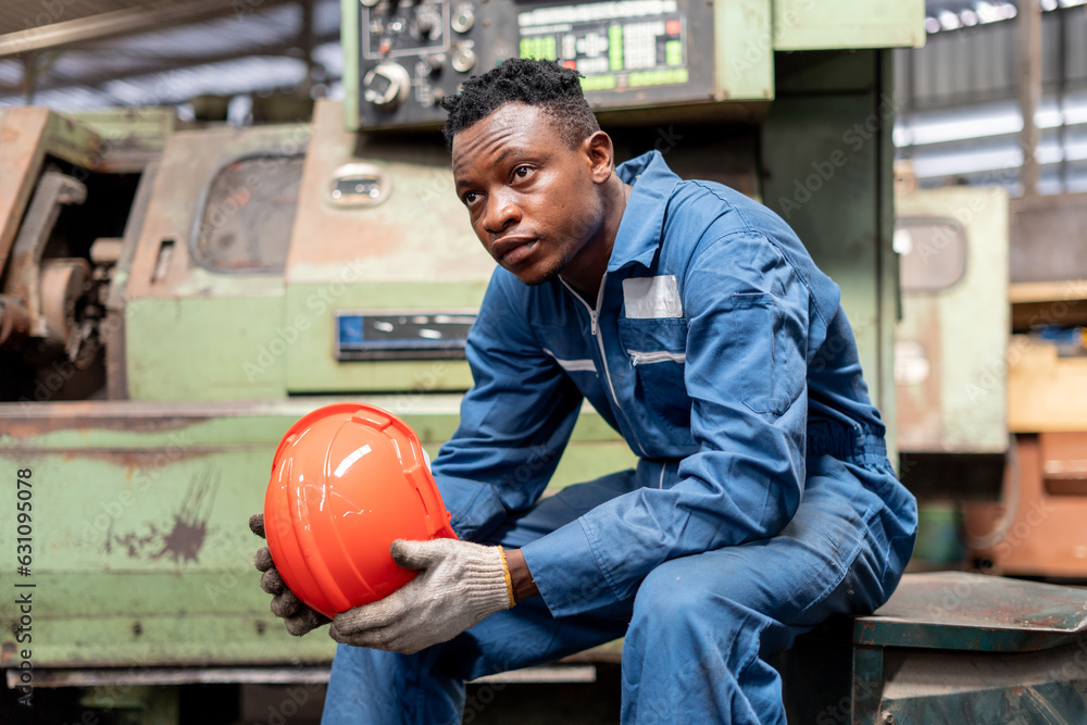 Φωτογραφία tried african american engineer worker so sad sitting take a break burn out of from hard work disappointed with the economy