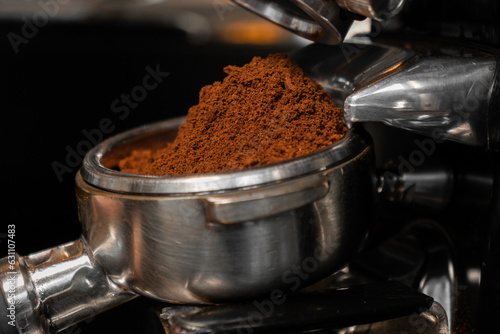 Portafilter in stainless coffee grinder