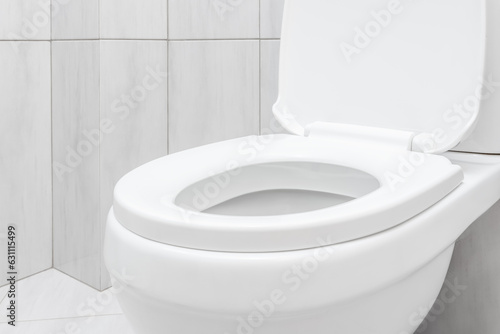 Fotografie toilet bowl at domestic bathroom.