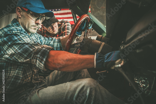 Classic Car Owner and His Professional Car Mechanic Performing Checks