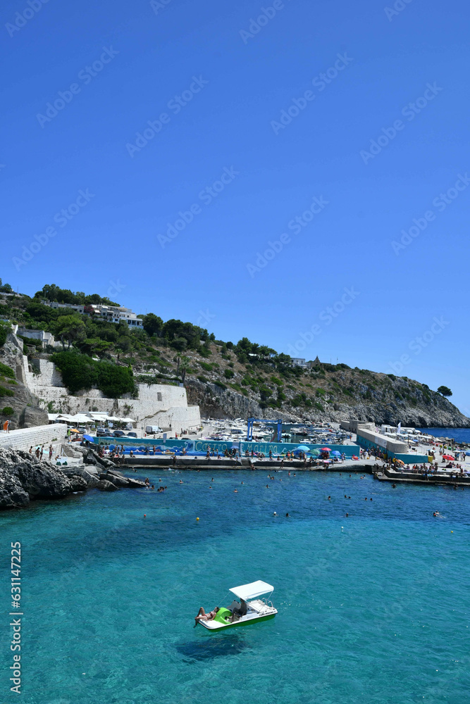Obraz premium View of the small bay overlooked by a small village in the province of Lecce, Italy.