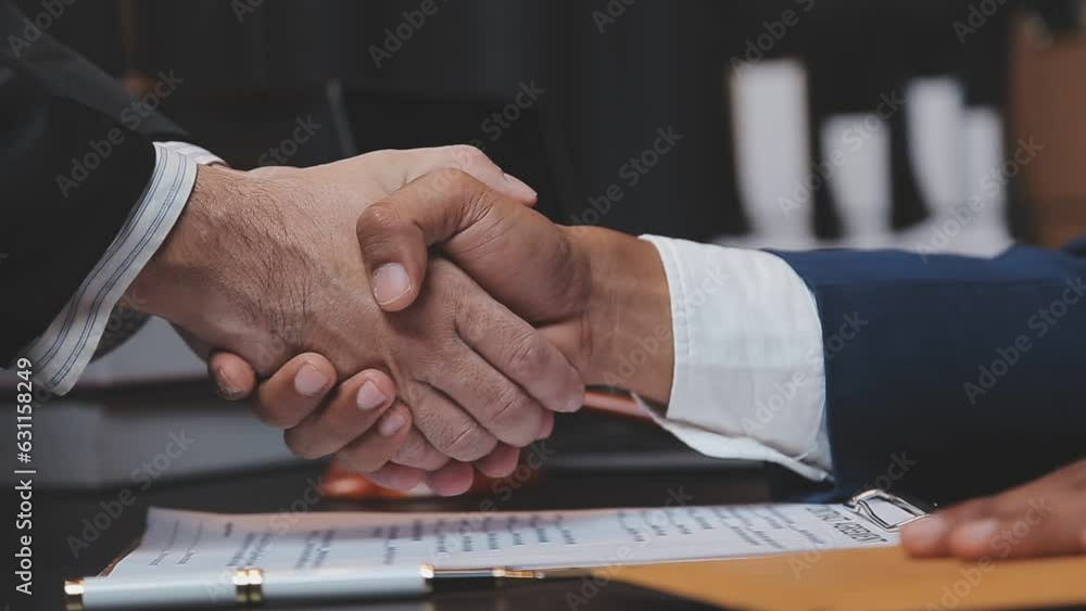 Business and lawyers discussing contract papers with brass scale on desk in office. Law, legal services, advice, justice and law concept picture with film grain effect Business and lawyers discussing contract papers with brass scale on desk in office. Law, legal services, advice, justice and law concept picture with film grain effect
