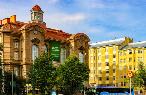 Street photo of Helsinki Finland with sunny summer weather and nice architecture. 