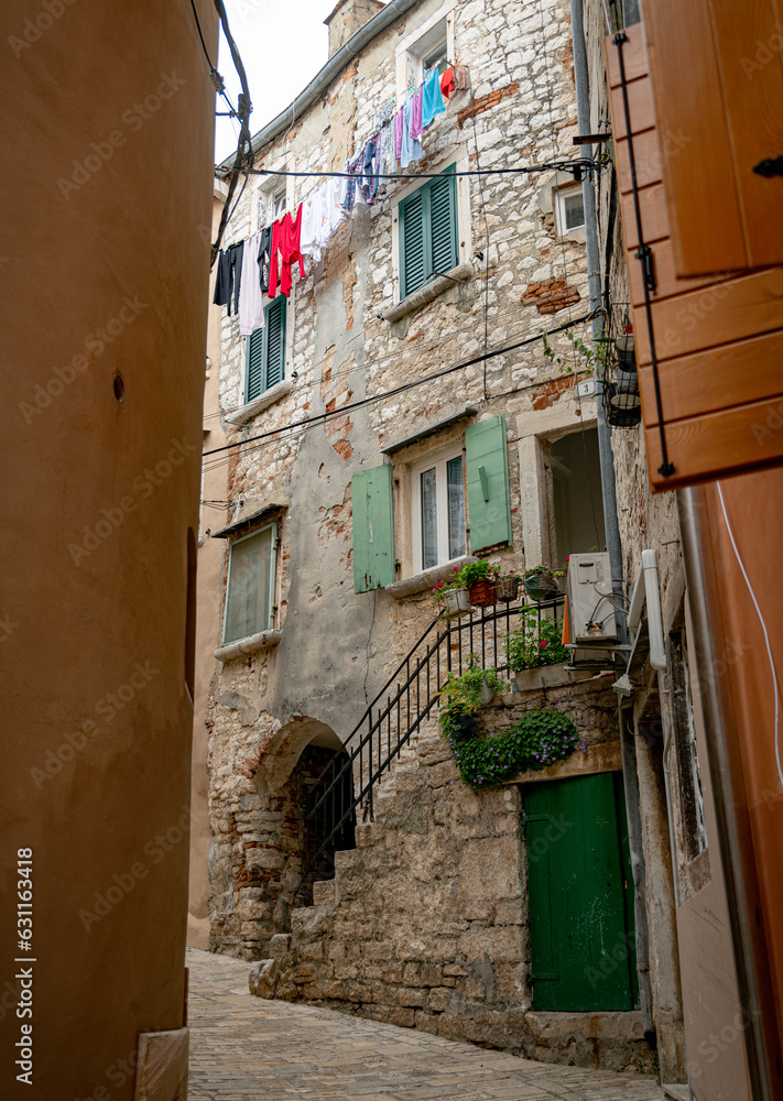 street in the croatian village of Rovinj with laundry on the line