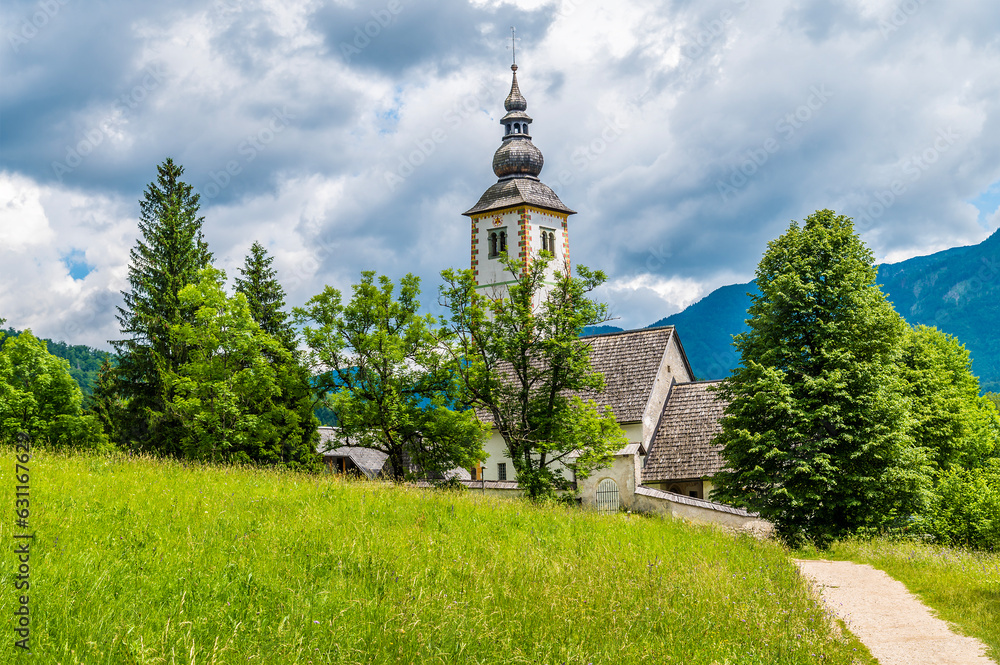 A view towards the church of Saint John the Baptist at Bohinjsko Jezero, Slovenia in summertime