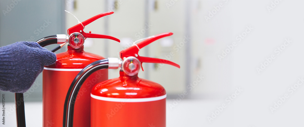 Fire extinguisher has hand engineer checking pressure gauges and prevent icons to prepare fire equipment for protection in emergency case and safety or rescue and alarm system training concept. Fire extinguisher has hand engineer checking pressure gauges and prevent icons to prepare fire equipment for protection in emergency case and safety or rescue and alarm system training concept.