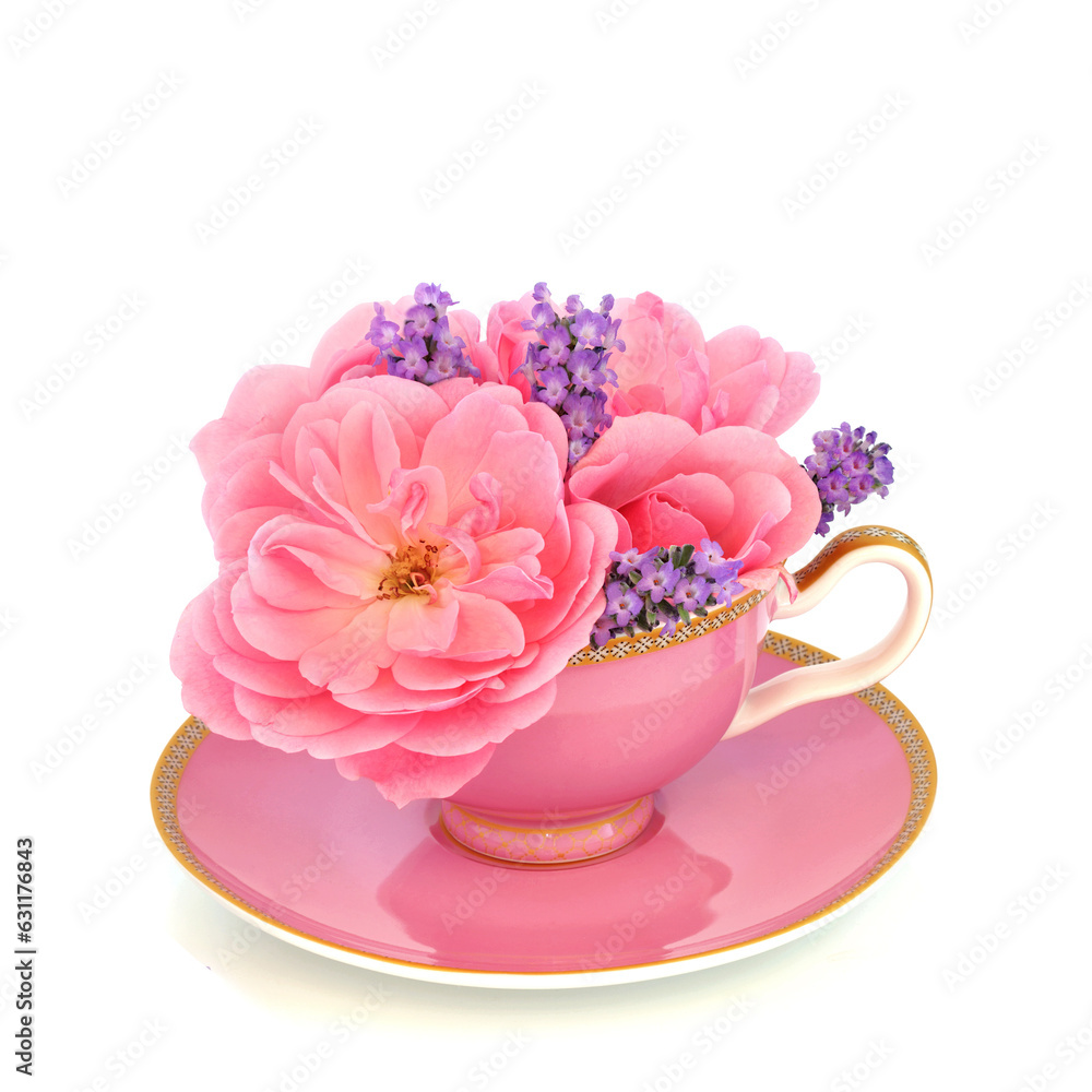 Lavender and pink rose flowers in tea cup on white. Surreal fun food alternative herbal medicine composition. Flowers have adaptogen calming and tranquilizing health benefits. Lavender and pink rose flowers in tea cup on white. Surreal fun food alternative herbal medicine composition. Flowers have adaptogen calming and tranquilizing health benefits.
