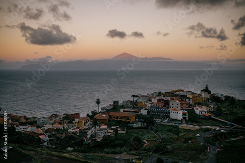 City with several buildings and water and mountains in the background, La Gomera, Spain