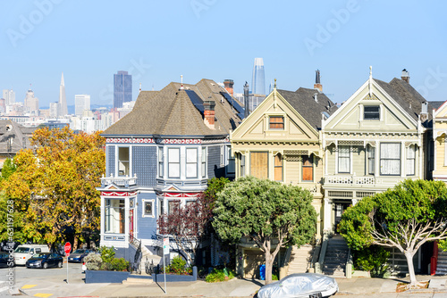 Row of colourful victorian-style houses in San Francisco on a sunny autumn day