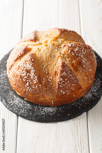 Mouna or Mona sweet bread or brioche dough made with a large amount of butter and flavored with orange blossom. Vertical photo