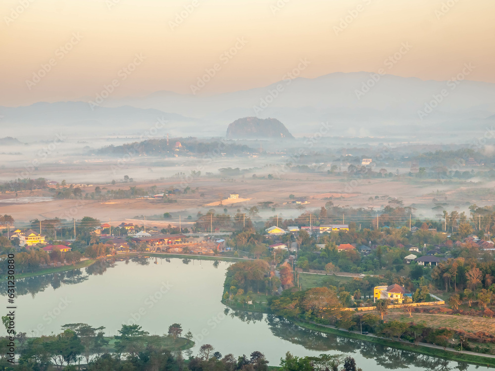 Fototapeta premium Natural viewpoint, mountains, hills, forests and river under morning mist in Chiangrai, Thailand