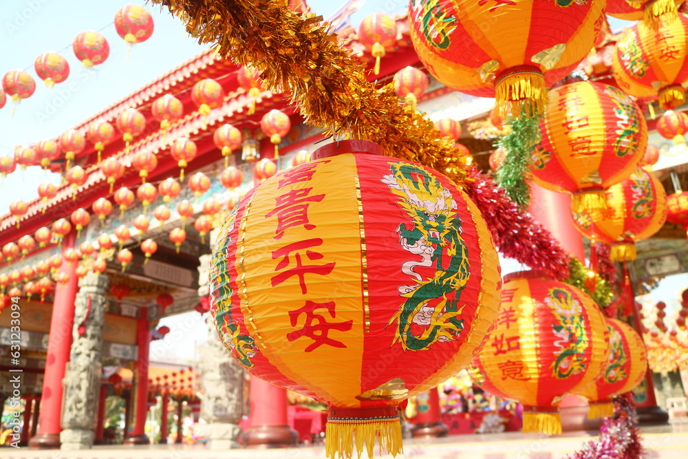 Lunar New Year Hanging Lantern with the Greeting Words Meaning WEALTH and PEACE in a Chinese Buddhist Temple