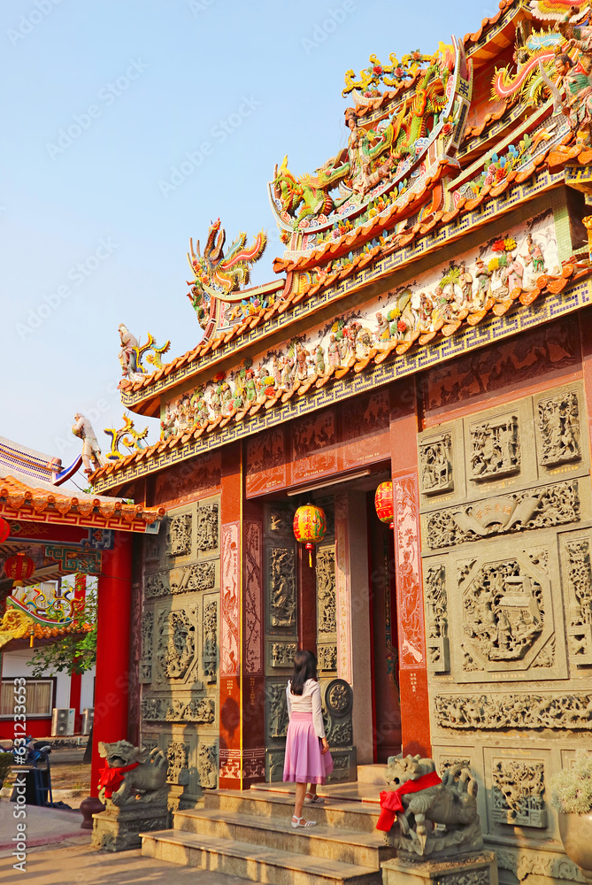 Female Visitor Entering the Gorgeous Shrine in a Chinese Buddhist Temple
