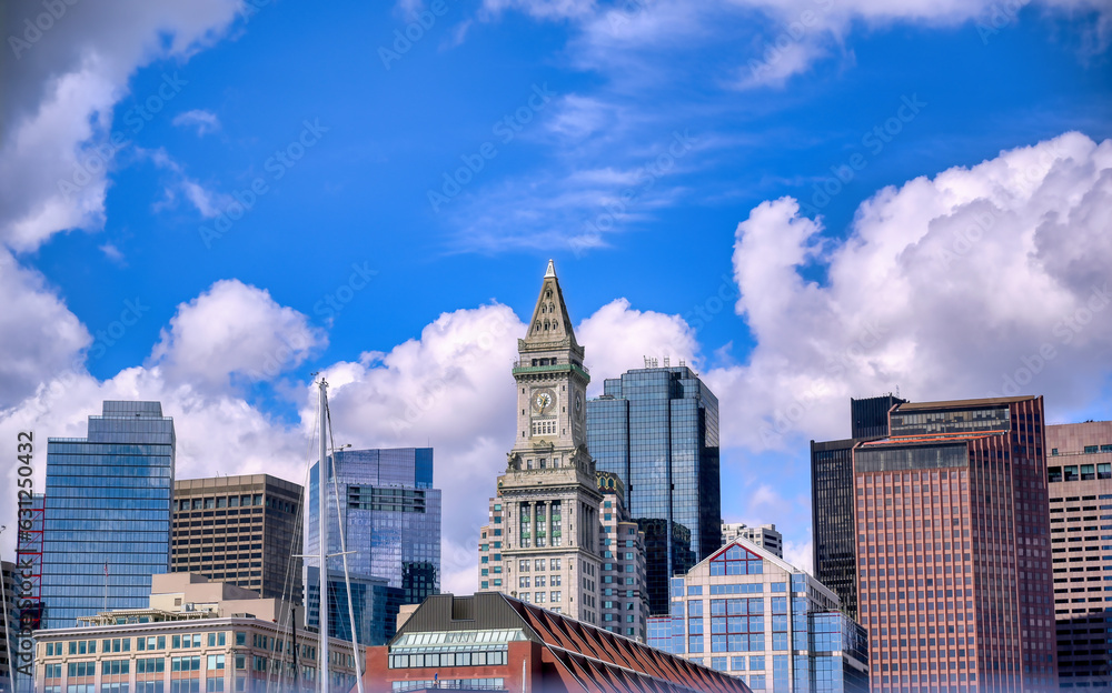 The Custom House Tower along the Boston, Massachusetts skyline on a sunny day.