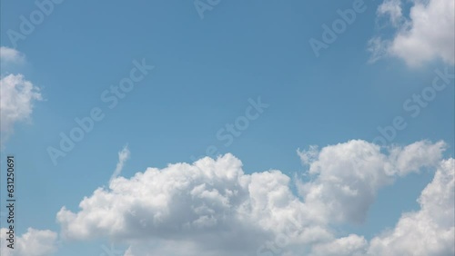 Timelapse of cloudy with blue sky.