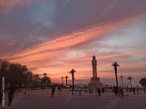 a red sky and izmir clock tower