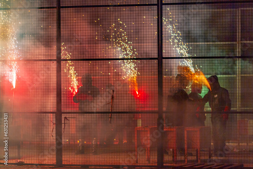 Men celebrate the "Cordá" festival, which consists of locking themselves in a metal cage and shooting rockets and other fireworks to enjoy 