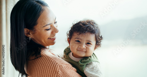 Mother, newborn and smile by window, home and happy together with care, love and bonding in childhood. Mom, infant baby and excited with connection, development and hug at family house in Canada