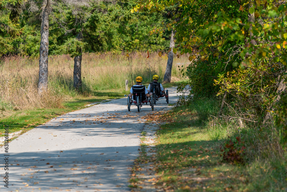 Adult Tricycles On The Trail In Fall