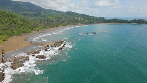 Aerial drone video of the coastline and beach of Dominicalito in Costa Rica