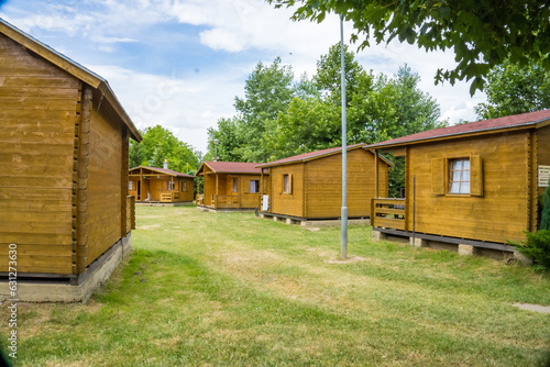 group of wooden summer houses for outdoor recreation. Camping on Zadni Treban. © Oksana