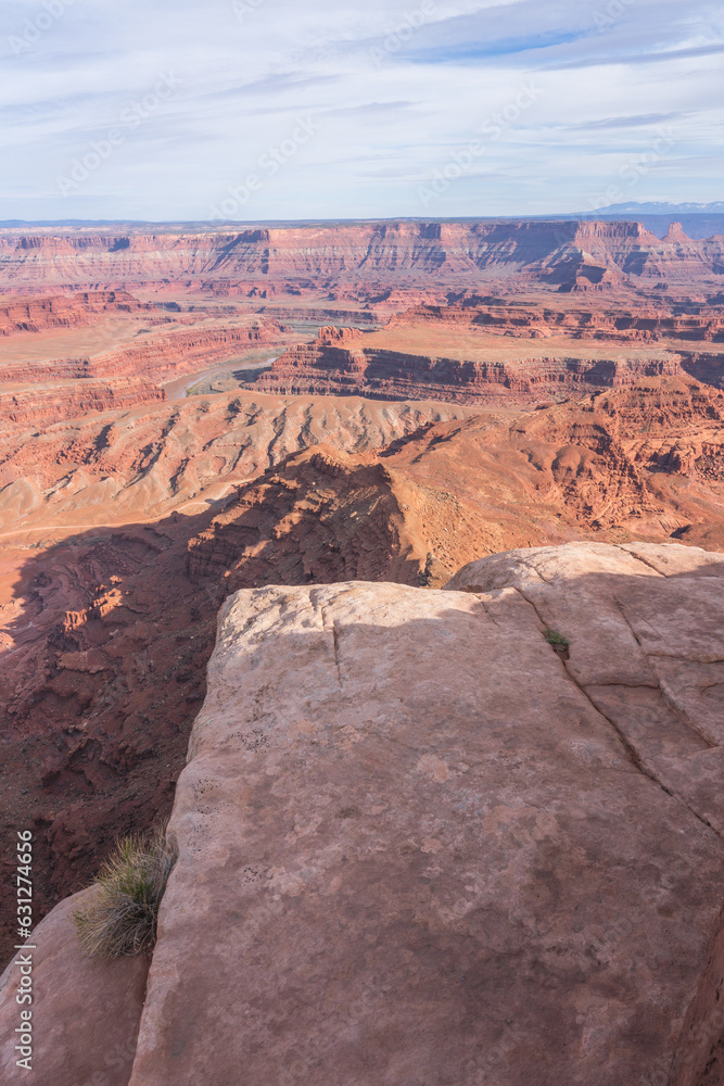 hiking the dead horse trail in dead horse point state park in utah, usa hiking the dead horse trail in dead horse point state park in utah, usa