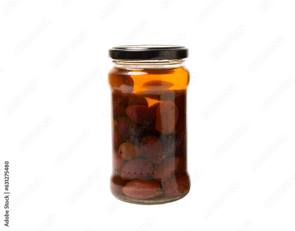 Delicious red olives in a jar isolated on white background. Pickled olives in a glass jar. Delicious olives. Close-up. Vegan. Delicious red olives in a jar isolated on white background. Pickled olives in a glass jar. Delicious olives. Close-up. Vegan.