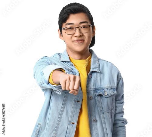 Young Asian man with clench...