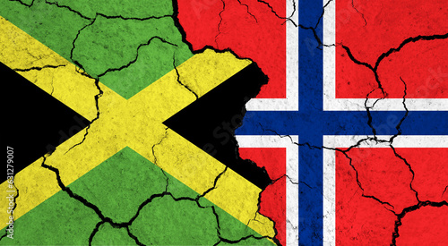 Flags of Jamaica and Norway on cracked surface - politics, relationship concept